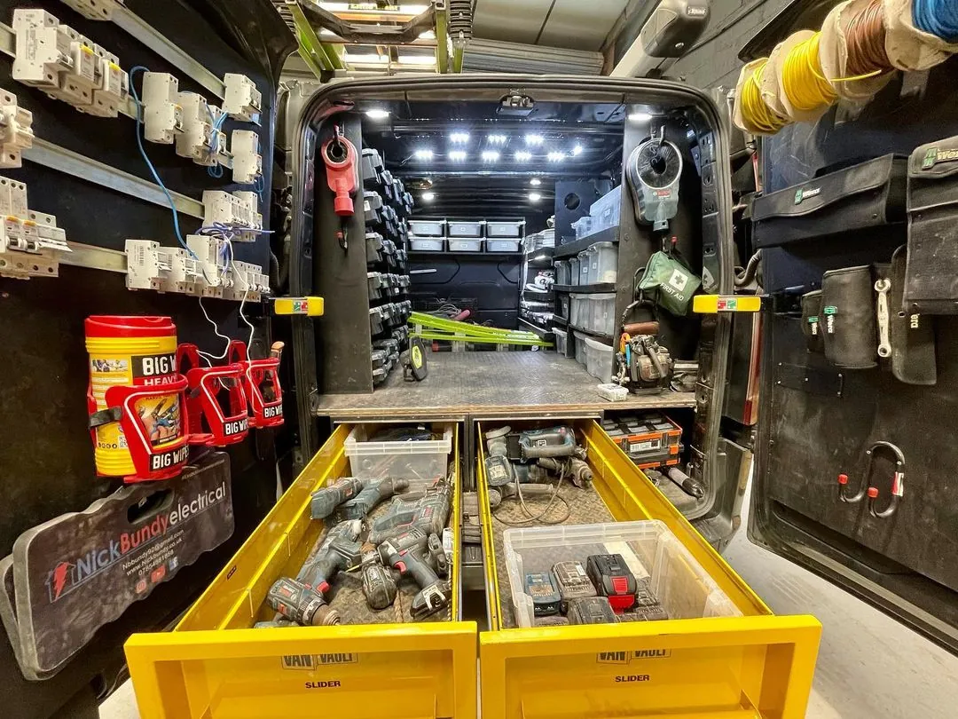 Inside Nick's van: shelving, cable reels and tool drawers