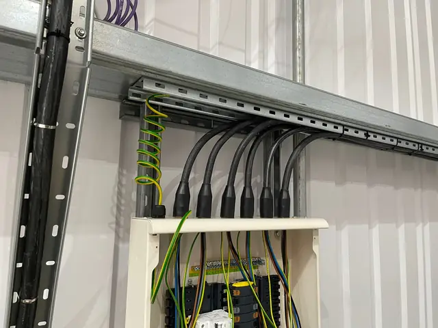 Cable tray and submains to a distribution board